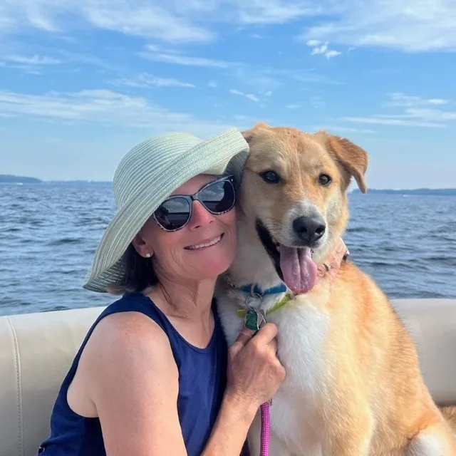 Woman-and-Dog-On-Boat