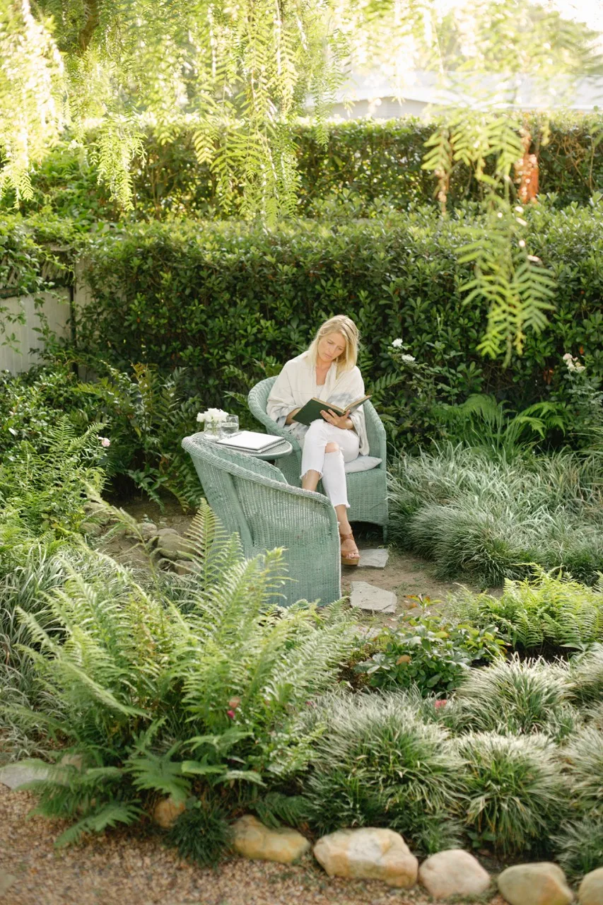 woman sitting in natural eco friendly garden