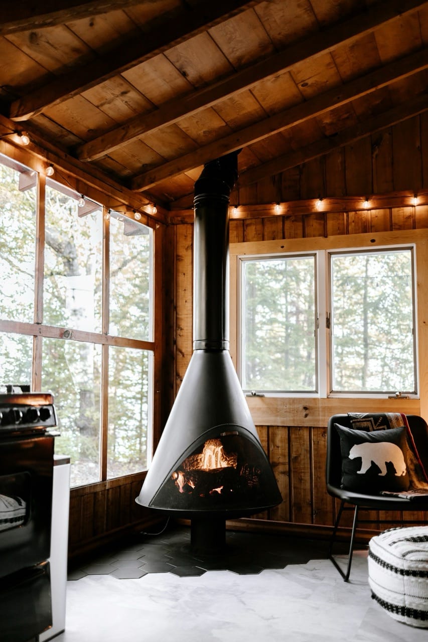 small-living-room-with-wood-burning-stove-hans-isaacson