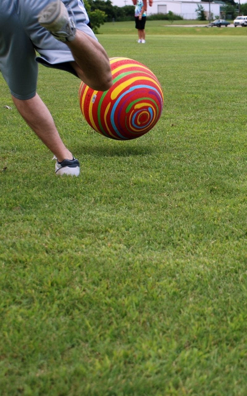 a-man-playing-kickball
